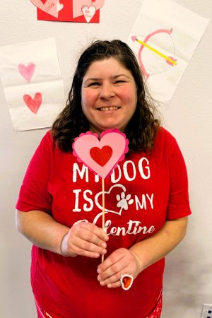 Woman holding paper heart