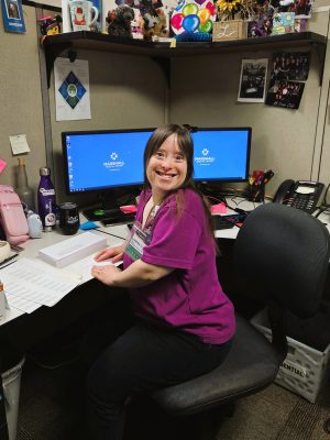 Woman sitting at office desk